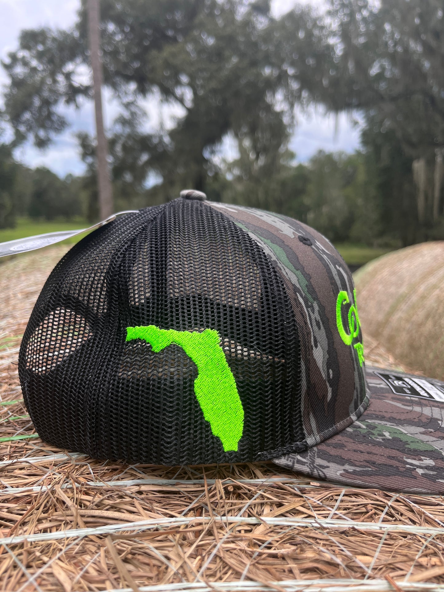 Original Logo Neon Green Stitch Realtree Bark Camo Trucker Hat