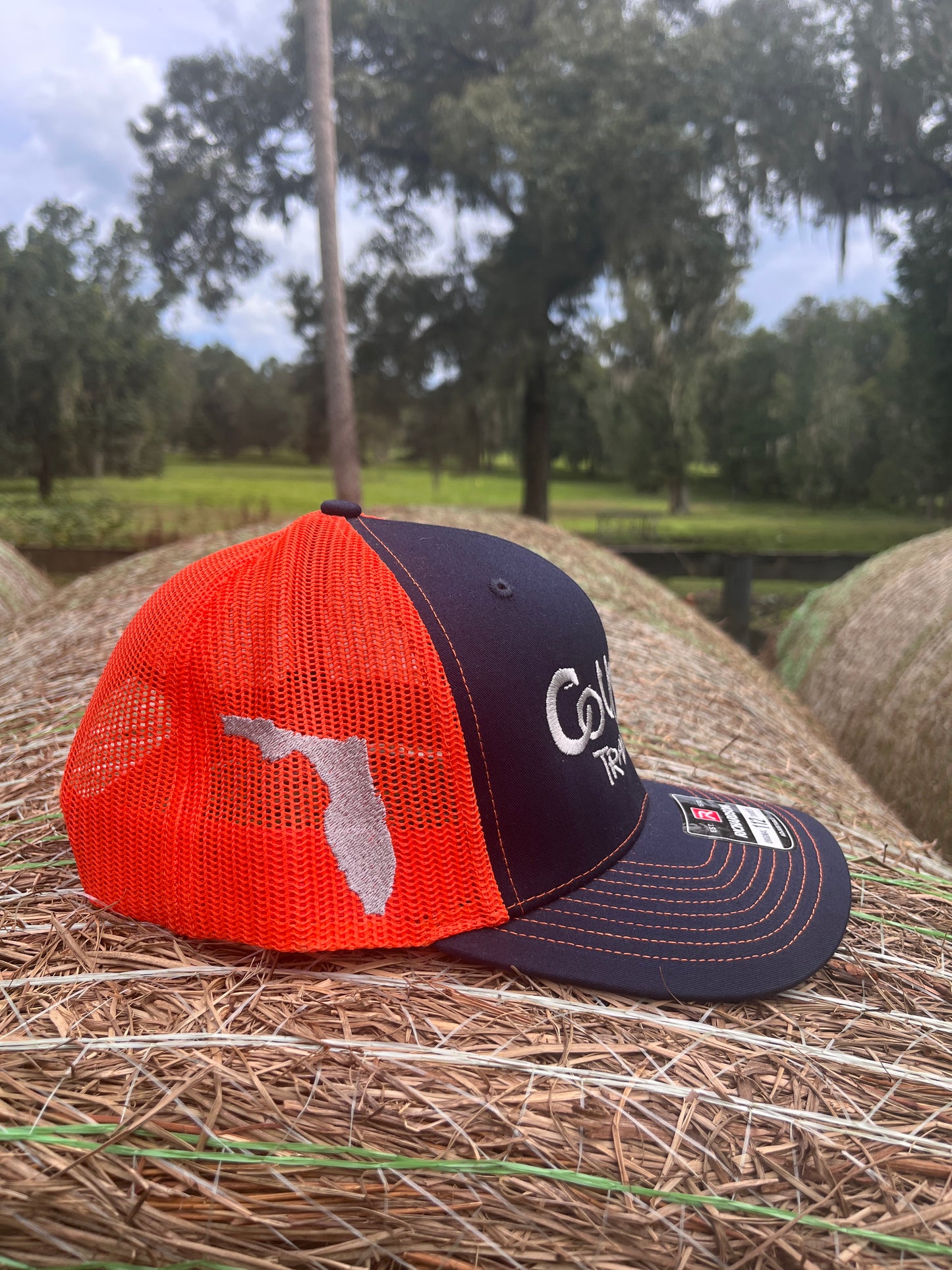 Original Logo Silver Stitch Navy/Orange Trucker Hat