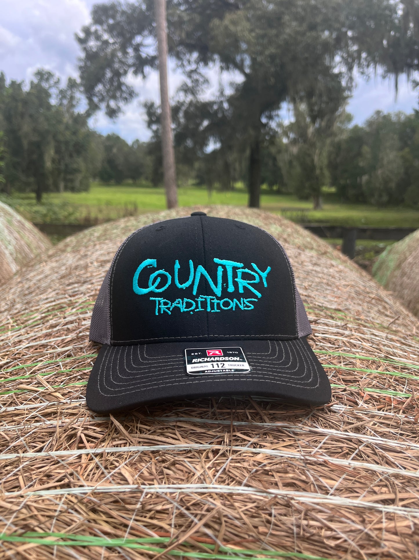 Original Logo Teal Stitch Black/Charcoal Grey Trucker Hat