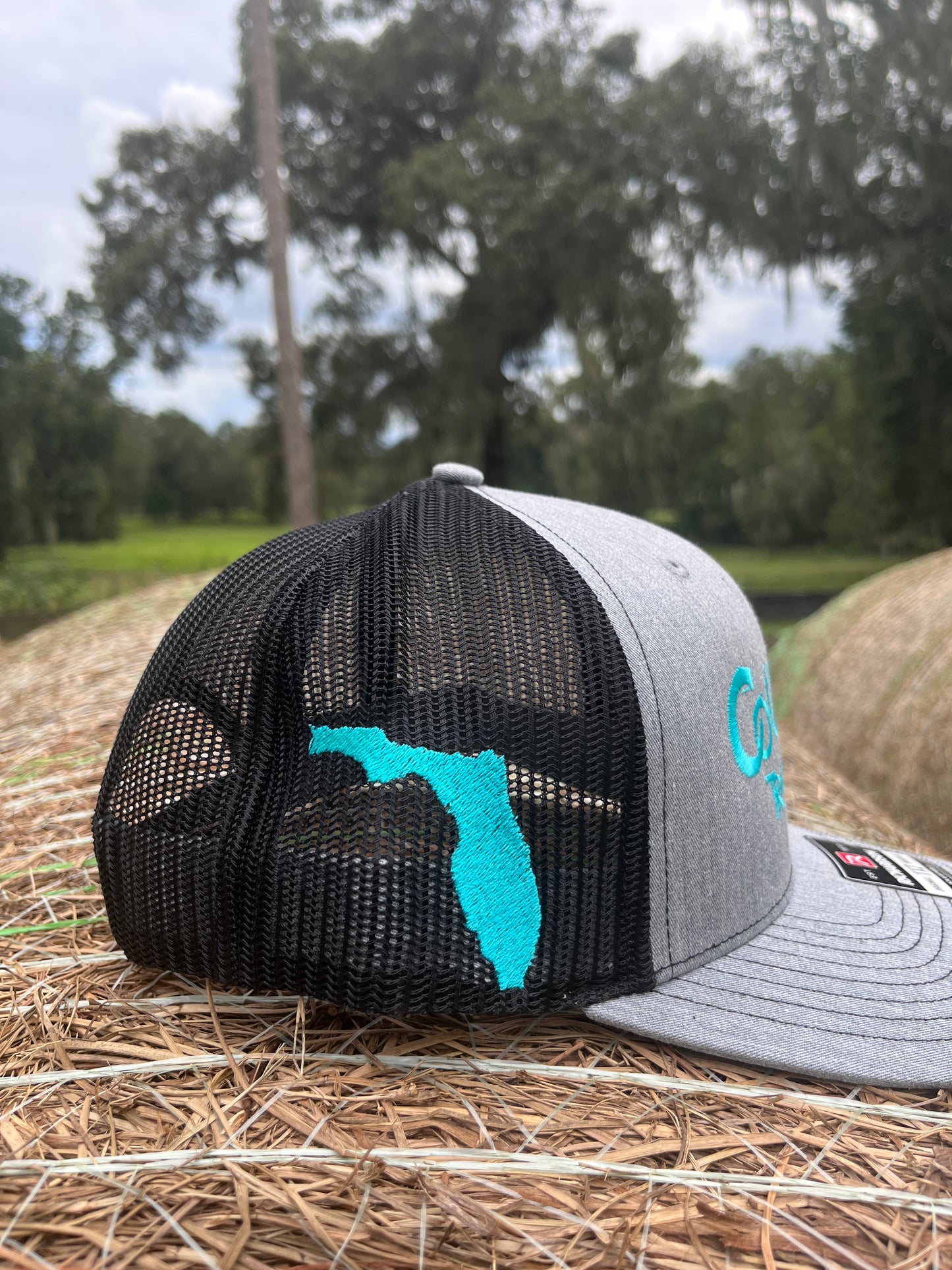 Original Logo Teal Stitch Heather Grey/Black Trucker Hat